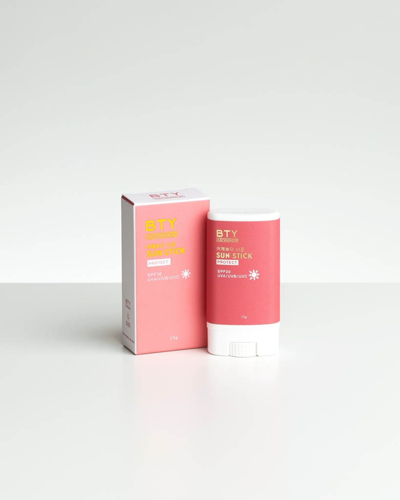 BTY Advance Sun Stick on a stack of books